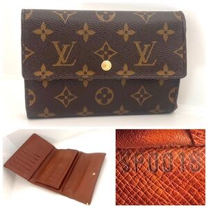 Good condition authentic Louis Vuitton Monogram Porte Etui wallet SP0019
